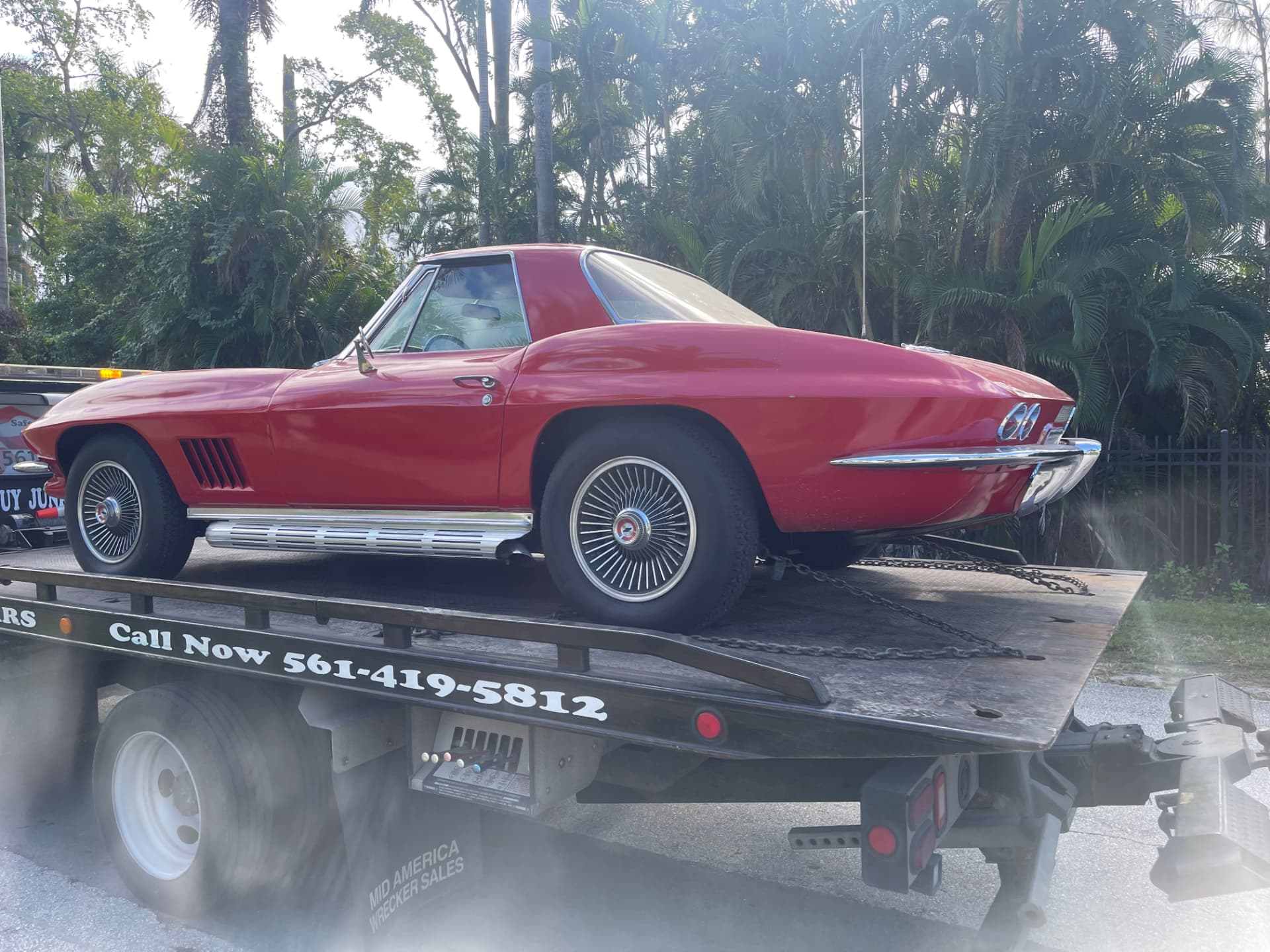 High Solar Towing transporting a classic Corvette in Delray Beach, FL